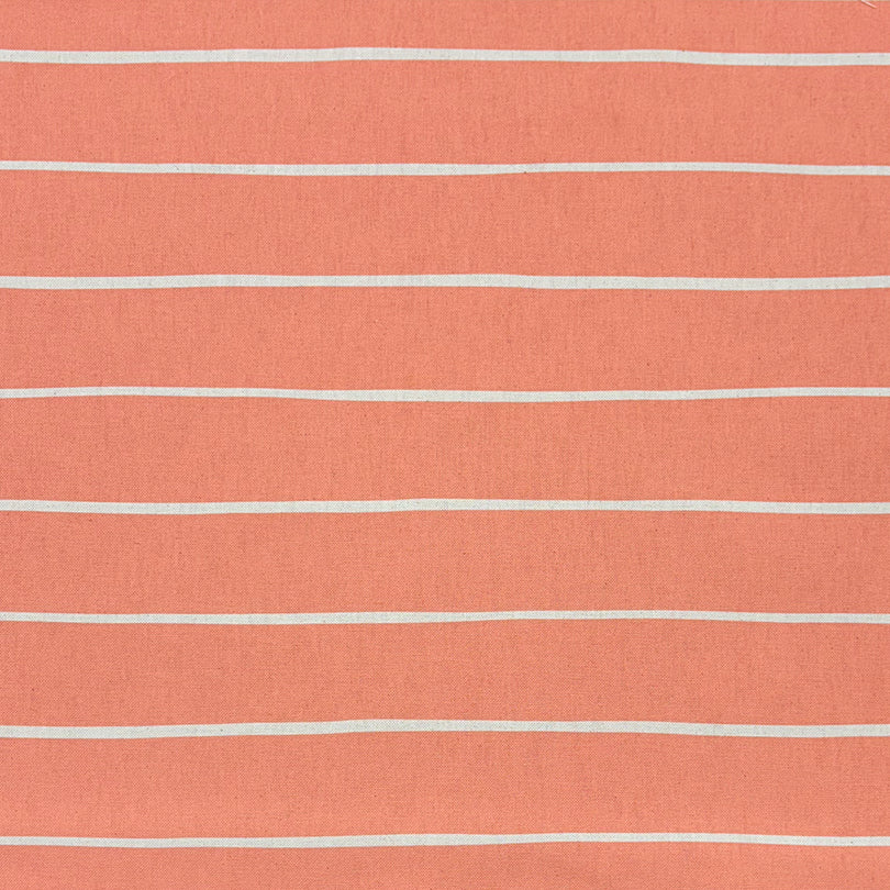 Peach striped curtain fabric with soft, warm pastel hues for elegant interiors