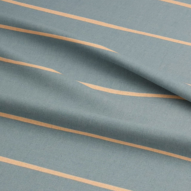 Adige Sky striped curtain fabric, ideal for adding a serene touch to home interiors.