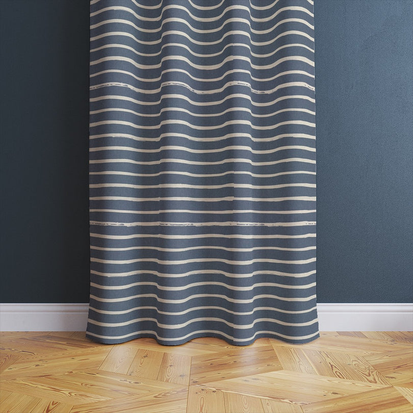 Alcantara Navy fabric featuring clean horizontal stripes, adding a timeless elegance to soft furnishings.