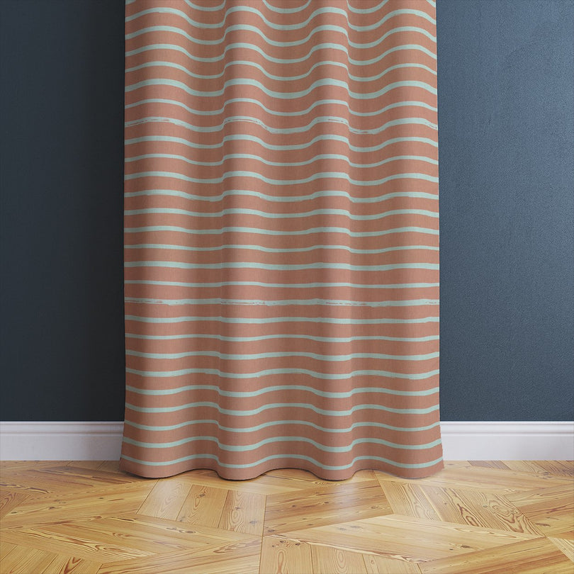 Alcantara Peach fabric with a subtle horizontal stripe, adding warmth and texture to soft furnishings.