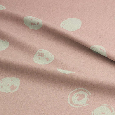 Close-up of Alene blush spotted upholstery fabric pattern