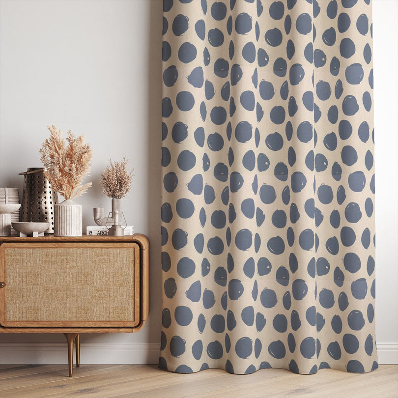 Arno Spot Navy fabric, a rich blue curtain fabric featuring a modern polka dot pattern.