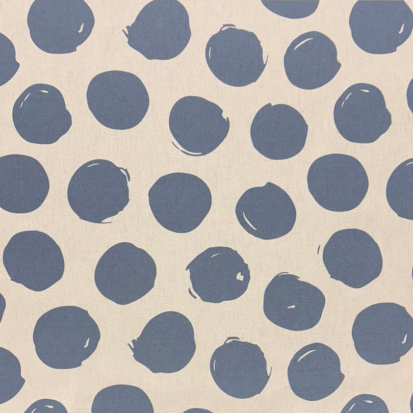 Arno Spot Navy curtain fabric, a deep blue polka dot print perfect for sophisticated interiors.