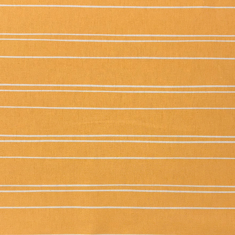 Ochre striped upholstery fabric with a warm, inviting feel