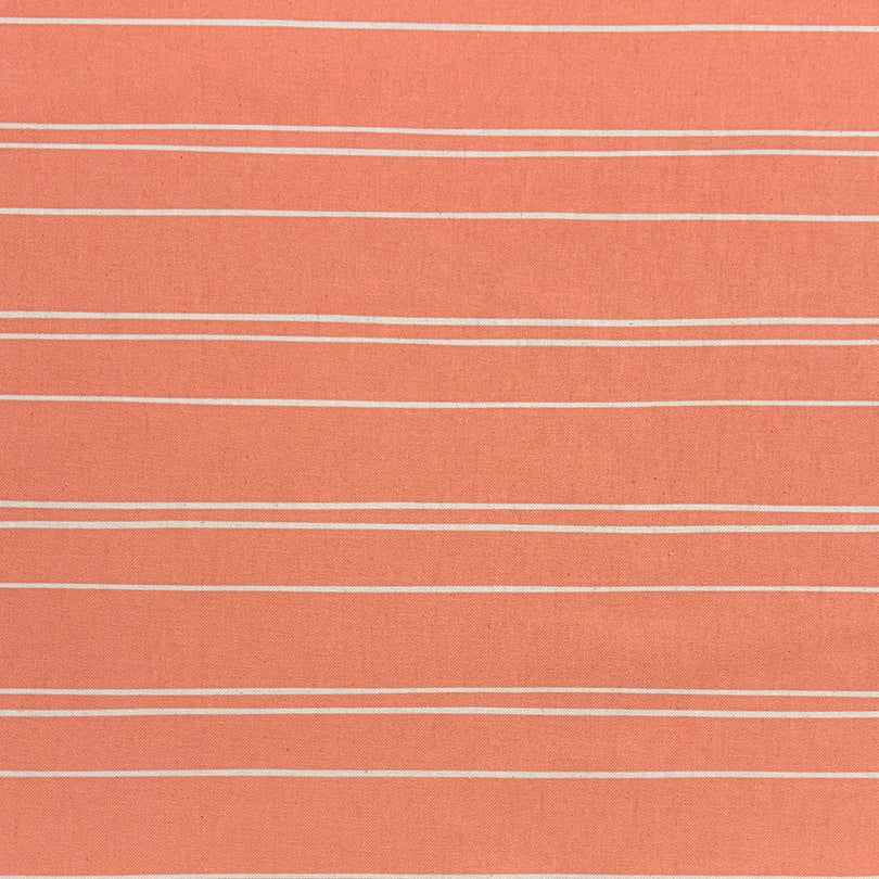 Peach striped upholstery fabric with a soft, elegant tone