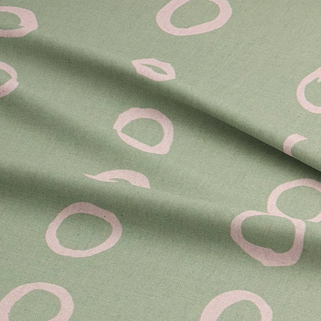 Calaggio Lemongrass Polka Dot Curtain Fabric - Draped Sample showing the soft movement and texture.