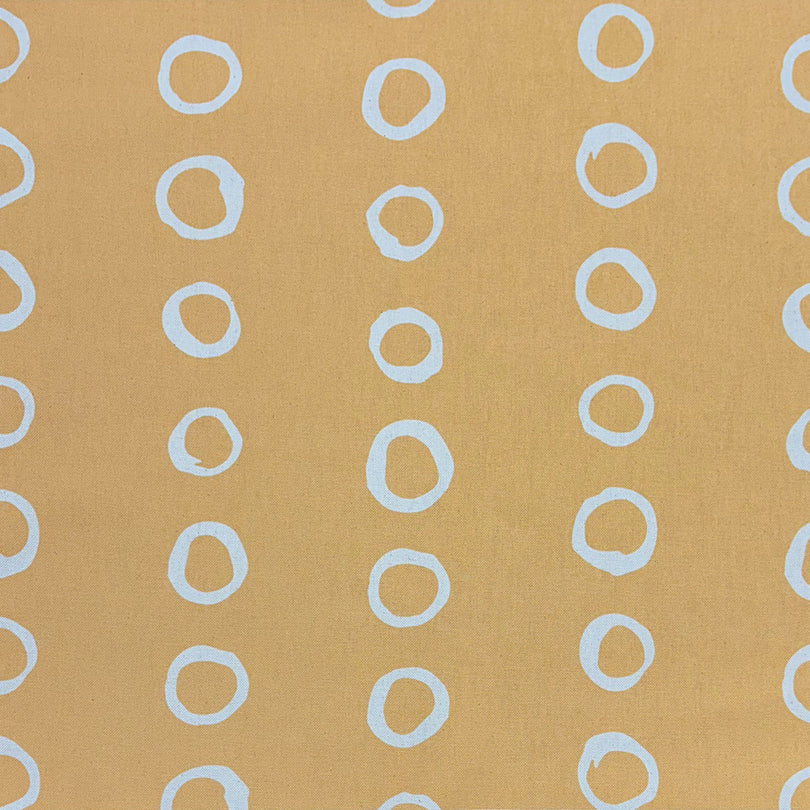 Calaggio Ochre Spotty Polka Dot Curtain Fabric - Flat Sample with a golden ochre background and stylish dotted pattern.