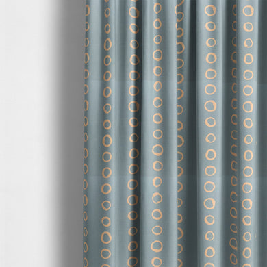 Calaggio Sky Spotty Curtain Fabric - Styled Room View featuring a modern interior with sky blue polka dot curtains.