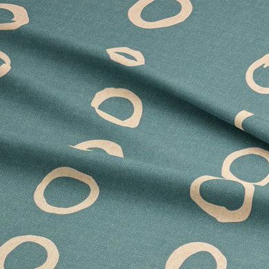 Calaggio Teal Spotty Polka Dot Fabric - Draped Sample showcasing its texture and elegant drape.