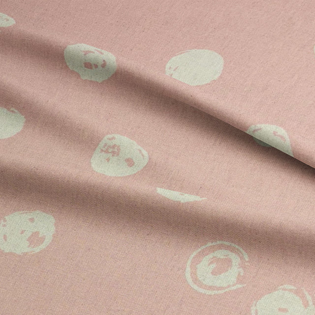 Soft blush polka dot curtain fabric from the Chiese collection, perfect for stylish interiors.