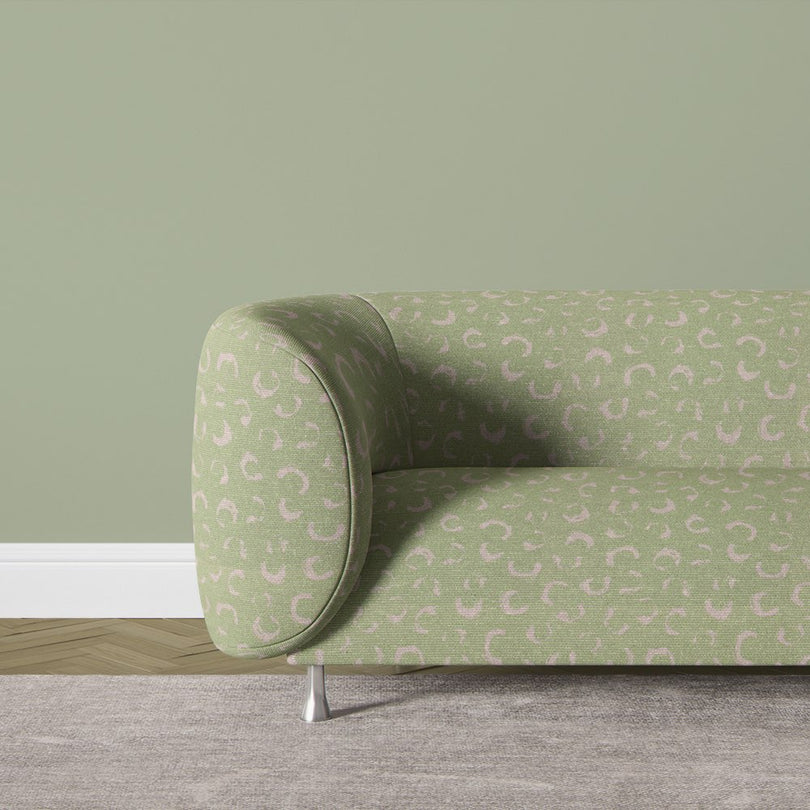 Durance lemongrass green fabric with an elegant abstract print, perfect for enhancing the aesthetic appeal of interior furniture.