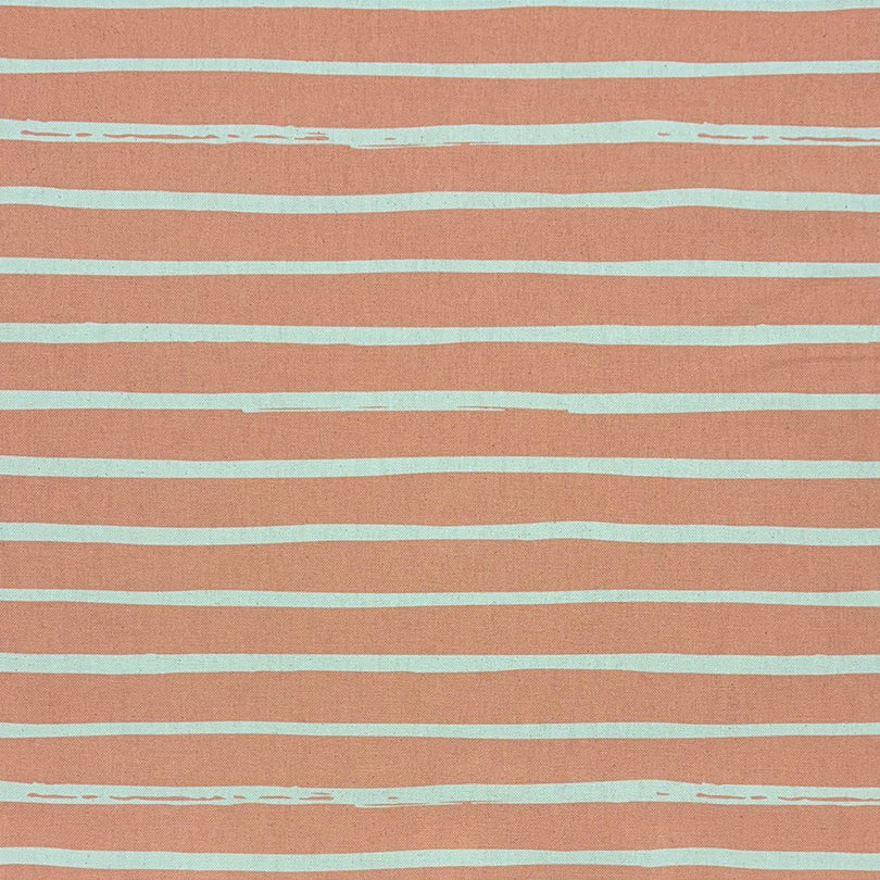 Peach striped upholstery fabric with a soft and elegant finish, perfect for adding warmth and charm to home interiors.