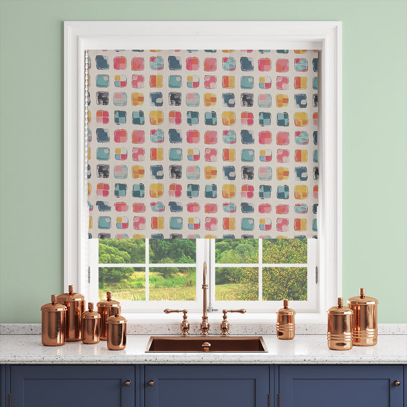 Trendy multicoloured curtain fabric blind with a bold artistic design.