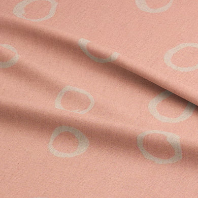 Blush polka dot curtain fabric – the Limentra design brings a playful yet refined look to interiors.