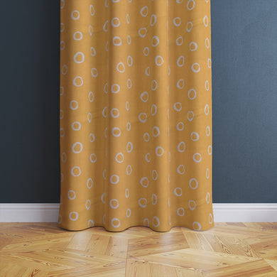 Limentra Ochre polka dot fabric – a vibrant yellow curtain fabric with a playful spotted pattern.