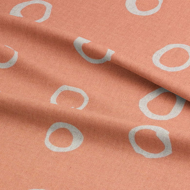 Peach polka dot curtain fabric – a fresh and lively spotted fabric for elegant window treatments.