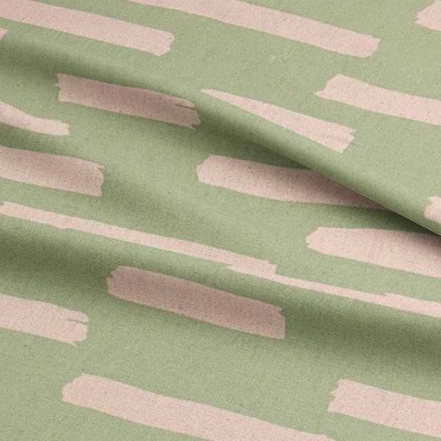 Lemongrass Liri fabric for curtains, a soft green textile ideal for a refreshing decor scheme.