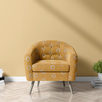 Moselle ochre polka dot fabric for sophisticated soft furnishings, blending modern design with vintage charm.