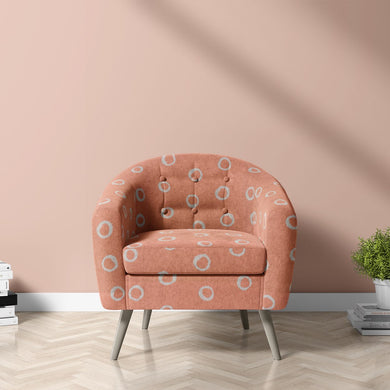 Moselle peach polka dot fabric for elegant sofas, chairs, and home décor accents with a unique hand-painted effect.