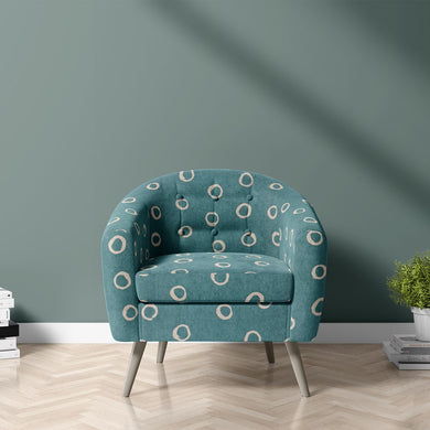 Moselle teal polka dot fabric for modern and luxurious upholstery projects, from statement sofas to stylish cushions.