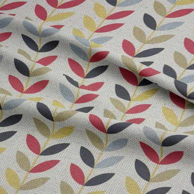 Multi-coloured printed upholstery fabric – stylish leaf design for sofas and chairs.